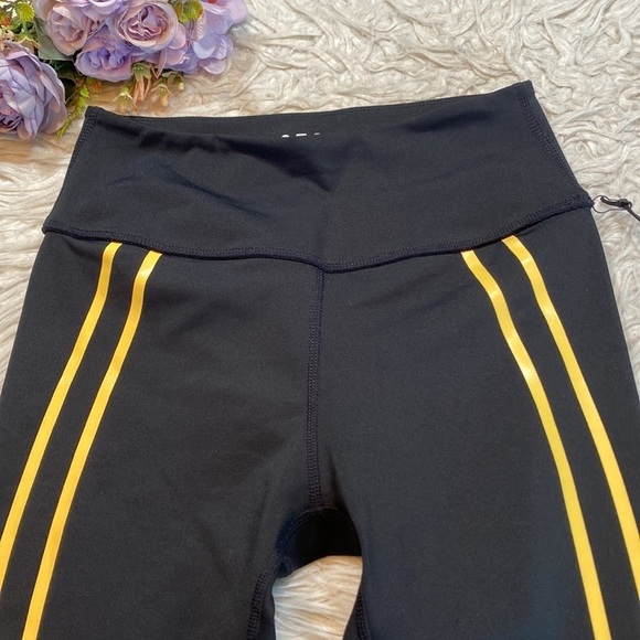Splits59 Black Leggings with Gold Stripes - Picture 4 of 10
